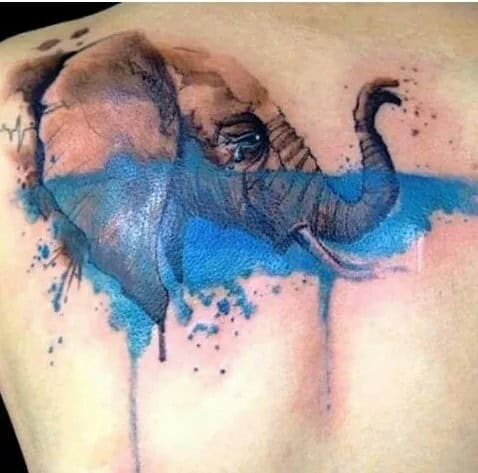 Watercolor Elephant Tattoo on Upper Back Designs for Women