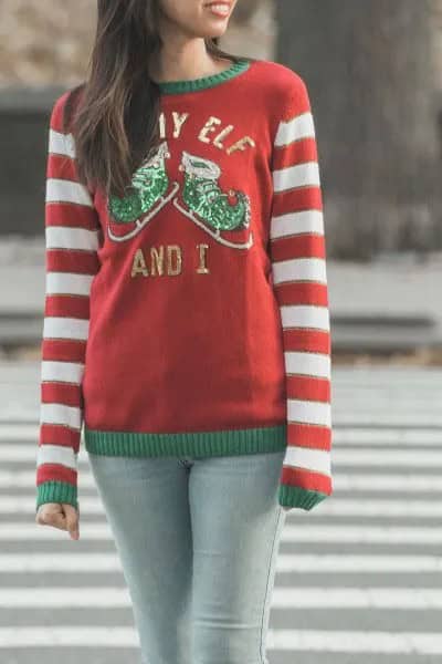 Red and White Striped Crew Neck Knit Sweater with Light Grey Skinny Jeans