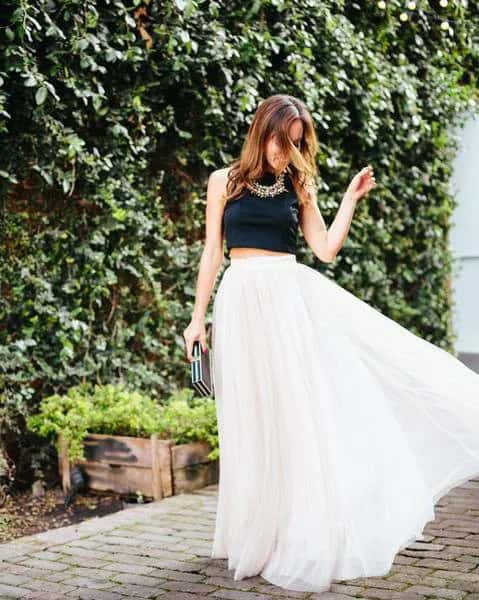 Black Cropped Sleeveless Top with White High Waisted Maxi Pleated Skirt