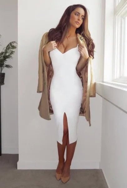 White Midi Dress with Camel Coat Draped Over Shoulders