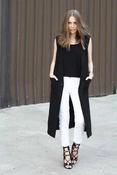 Black Long Sleeveless Vest with White Skinny Jeans