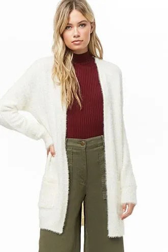 White Fuzzy Long Cardigan with Green Mock Neck Ribbed Sweater with Wide Leg Pants