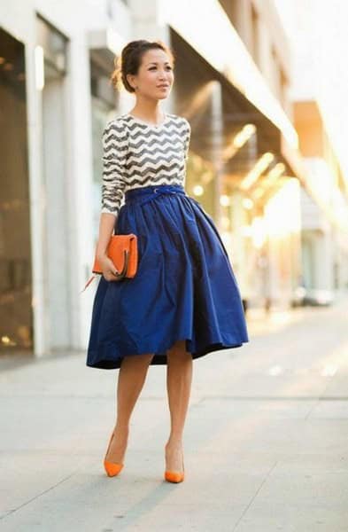 Black and White Patterned Top with Royal Blue Flared Skirt & Orange Heels