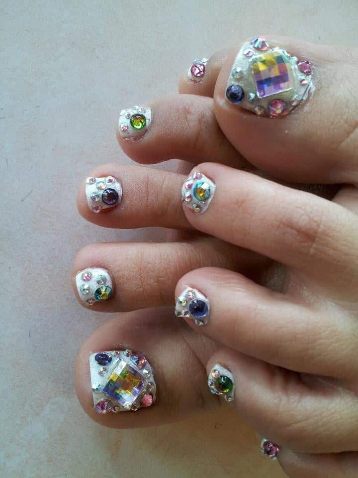 Toe nail art with crystals or rhinestones