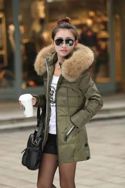 Olive Longline Fur Hooded Down Jacket with White Print Tee & Black Mini Shorts