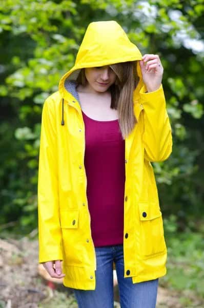 Yellow Raincoat Over Red Vest Top