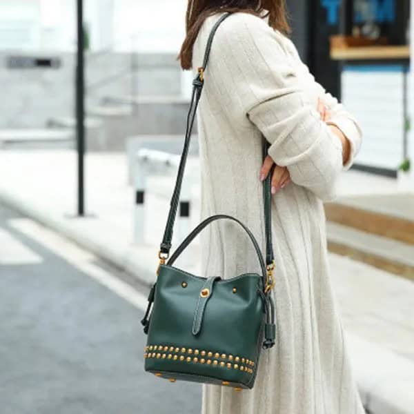 Ivory Longline Cardigan with Blue Jeans & Black Leather Bag