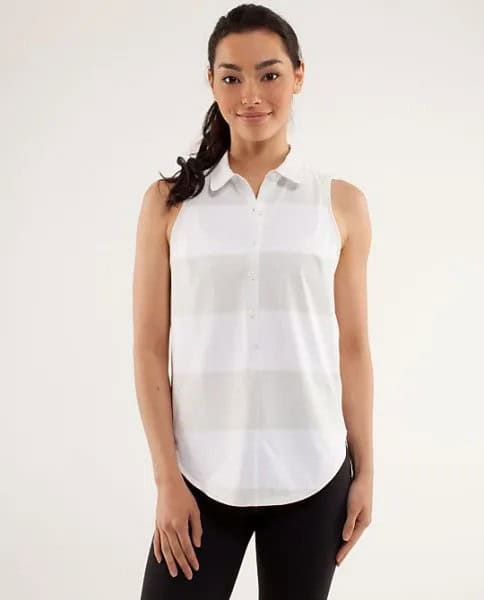 White and Grey Sleeveless Golf Shirt with Black Skinny Jeans