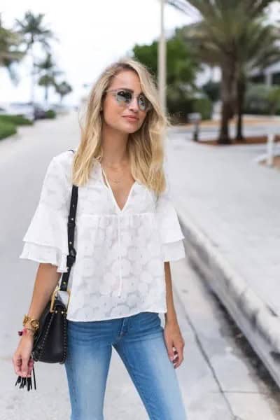 White Ruffle Sleeve Oversized Blouse with Light Blue Skinny Jeans