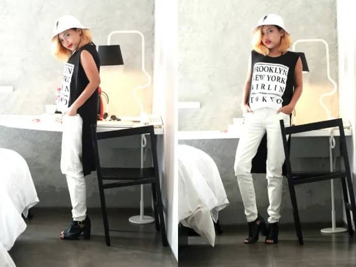 White Bucket Hat with Black Sleeveless High Low Top & Jeans