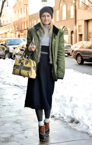 Green Quilted Jacket with High Waisted Navy Skirt