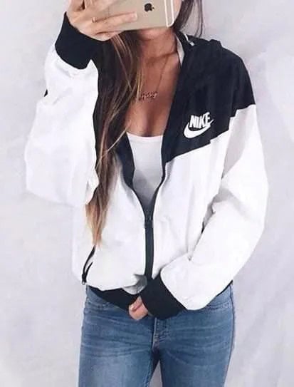 White and Black Nike Windbreaker with Low Neck Tank top & Jeans