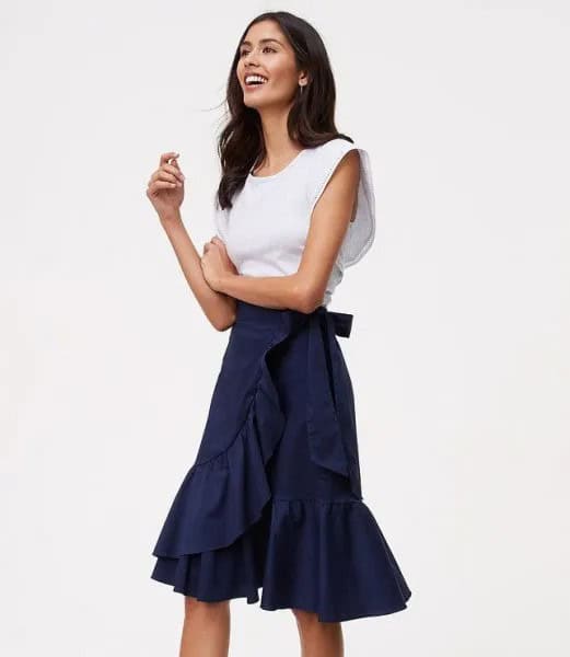 White Sleeveless Top with Navy Ruffle Skirt