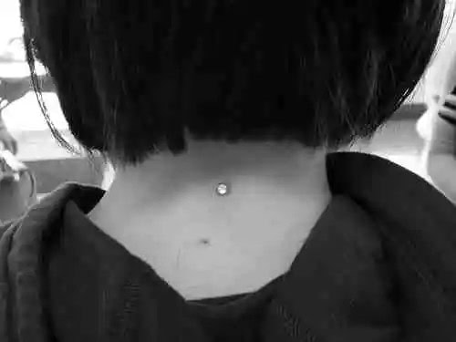 Neck and Nape Dermal Piercings