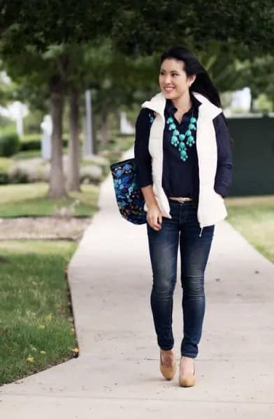 White Puffer Vest with Black Button Up Shirt & Dark Blue Skinny Jeans