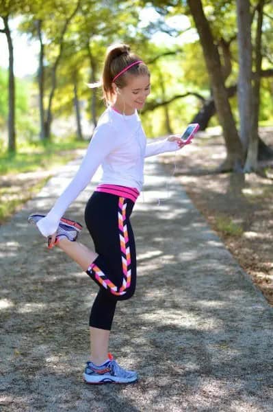 White Long Sleeve T Shirt with Black and Pink Cropped Running Pants