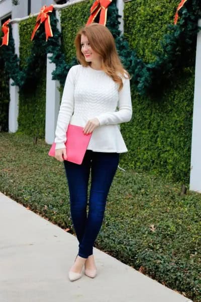 White Peplum Sweater with Pink Clutch Bag