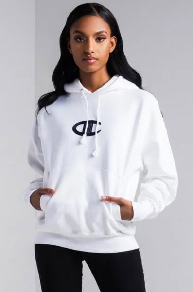 White Logo Embroidered Hoodie with Black Skinny Jeans