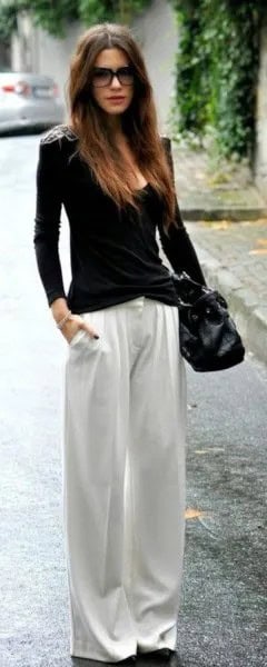 Black Form Fitting Scoop Neck Sweater with White Pants