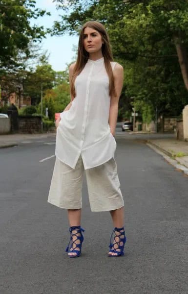 White Sleeveless Shirt Dress Over Pale Pink Wide Leg Cropped Pants