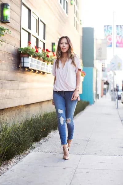 Pale Pink Chiffon Wrap Blouse with Ripped Skinny Jeans