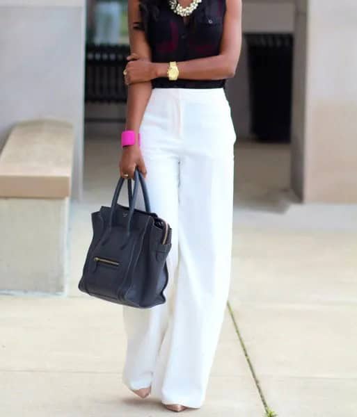 White Trousers with Black Sleeveless Blouse & Statement Necklace