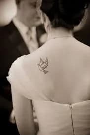 Flying Dove Tattoo on Upper Back