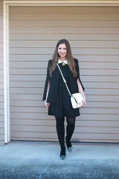 Black Dress with Blazer Draped Over Shoulders