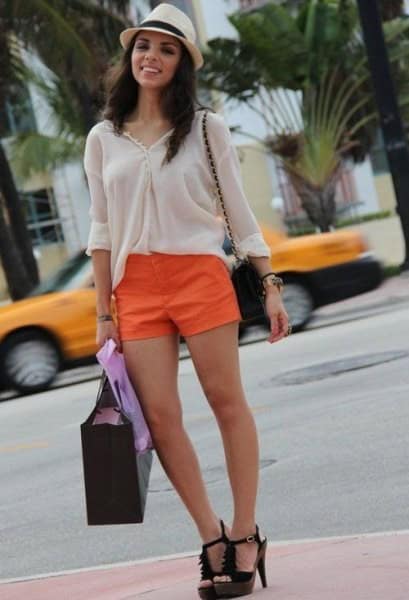 White Blouse with Straw Hat & Orange Mini Shorts