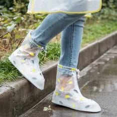 White Semi-Sheer Rubber Snow and Rain Boots with Jeans & Sweater