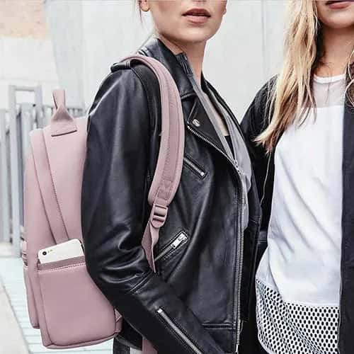 Black Leather Jacket with Grey Backpack Purse