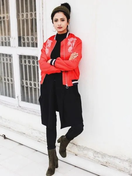 Red Embroidered Bomber Jacket with Black Crew Neck Sweater & Skinny Jeans