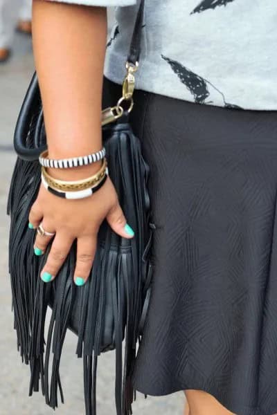 Grey Floral Printed Casual Sweater with Black Mini Skirt & Leather Fringe Bag