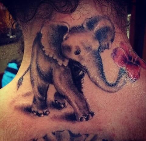 Elephant with Trunk Up Tattoo Designs at the Back of the Neck