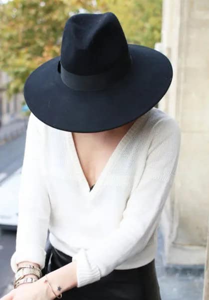 Black Felt Hat with White V Neck Sweater & Skinny Jeans