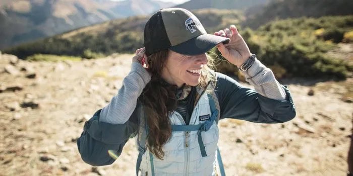 Grey Hiking Jacket with White Vest & Baseball Cap