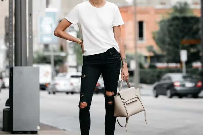 White T Shirt with Black Ripped Skinny Jeans & Pale Pink Leather Purse