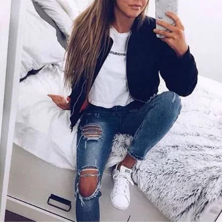 Black Bomber Jacket with White Graphic Tee & Really Ripped Blue Jeans