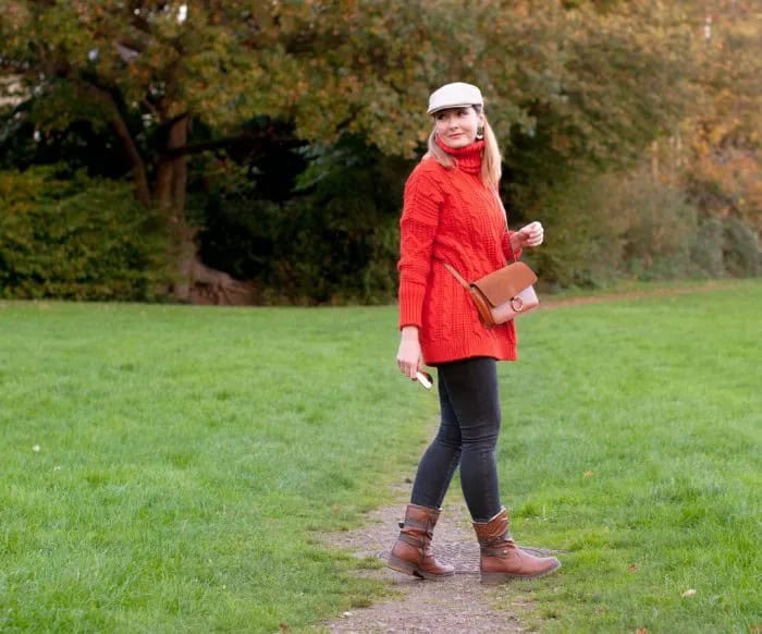 White Cap with Red Cable Knit Sweater