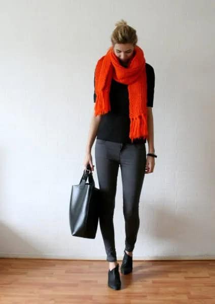 Black Sweater with Orange Fringe Scarf & Grey Skinny Jeans