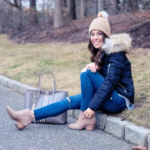 Black Down Jacket with Blue Skinny Ripped Jeans & Crepe Knit Hat