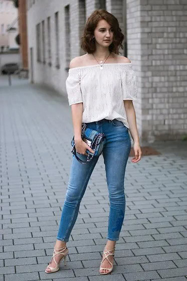 White Off The Shoulder Blouse with Skinny Jeans & Blue Denim Clutch Bag