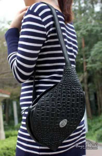 Navy and White Striped Long Sleeve Tee with Black Sling Leather Bag