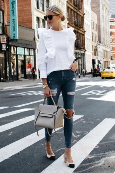 White Ruffle Shoulder Blouse with Ripped Grey Skinny Jeans