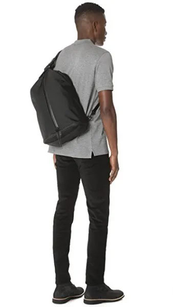 Grey Polo Shirt with Black Skinny Jeans & Sling Bag