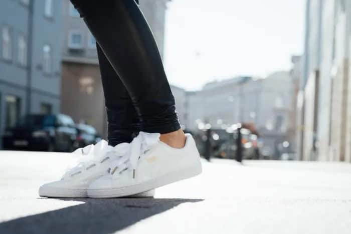 Black Leather Leggings with White Low Top Walking Sneakers