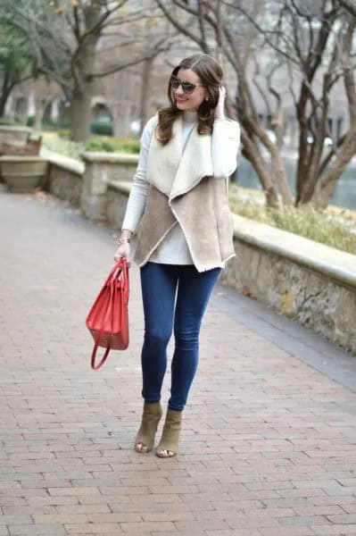 Grey Vest with White Sweater & Blue Skinny Jeans