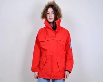 Red Faux Fur Hooded Windbreaker with Light Blue Jeans