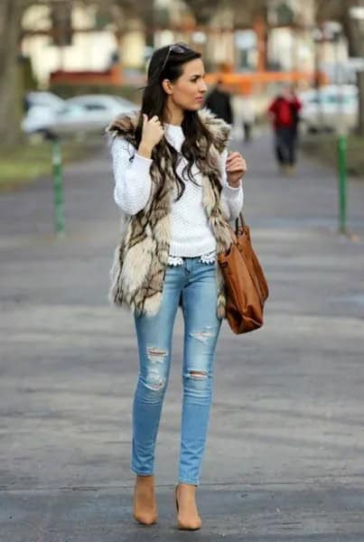 White Pullover Sweater with Faux Fur Vest & Light Blue Torn Skinny Jeans