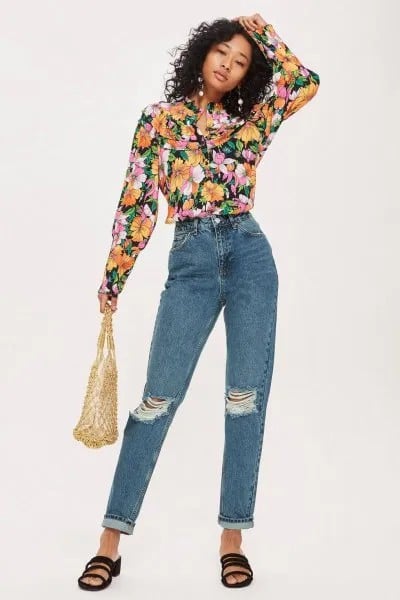 Black Floral Printed Blouse with Blue Ripped Jeans